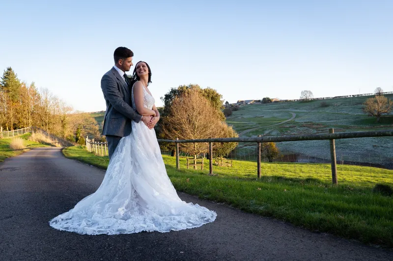 cotswolds bride groom posed countryside