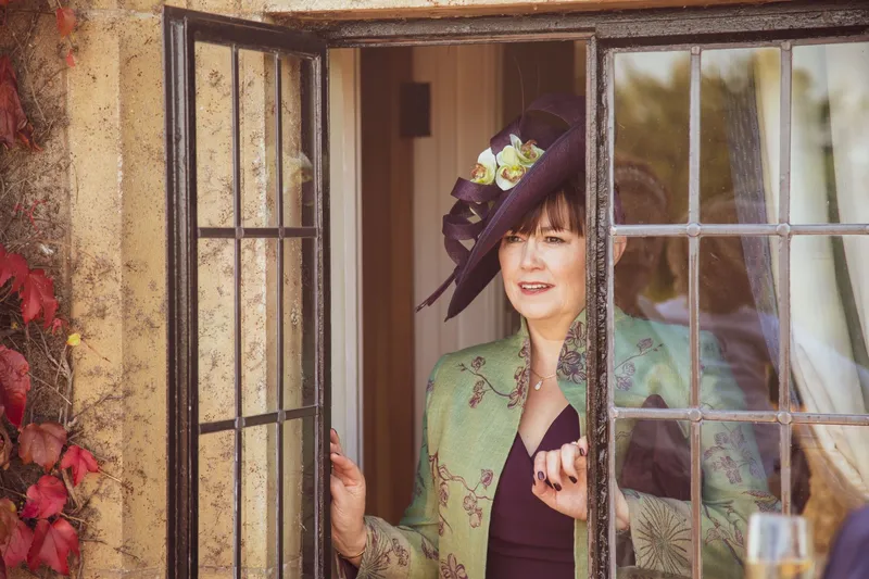 tones guest hat candid wedding